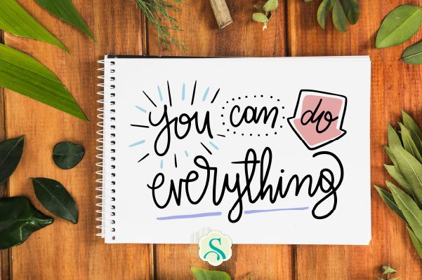 Blocos de anotações com frases motivacionais